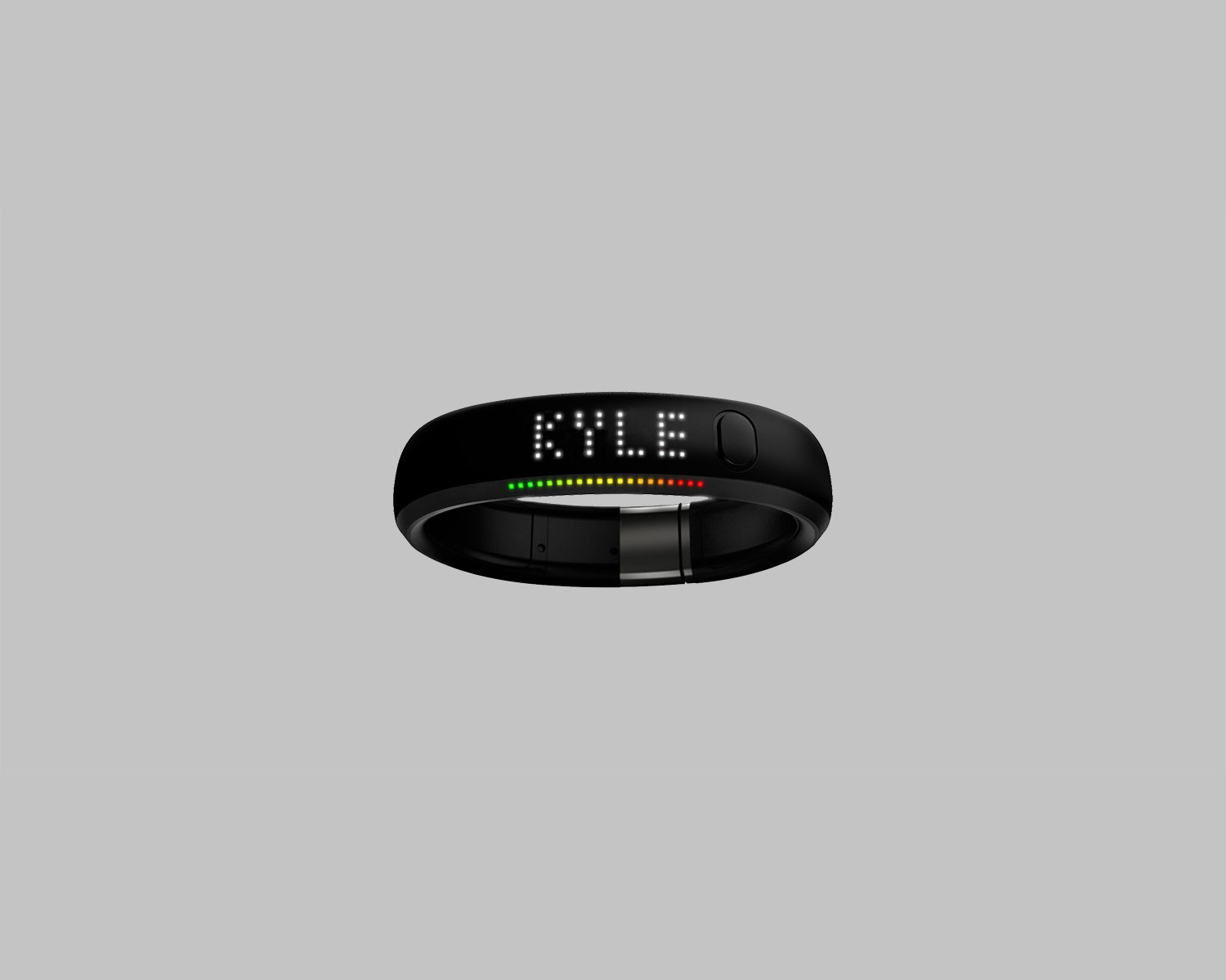Nike FuelBand watch with the word Kyle on its display